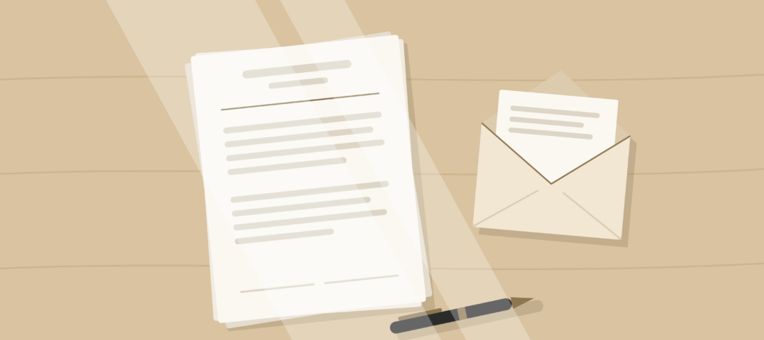 Tidy desk with a stack of papers, a pen and an open envelope in soft natural light