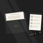 Tidy desk with a folder of papers, a checklist notepad and a pen in soft window light